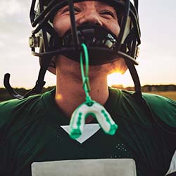 Football player with sportsguard in Casper