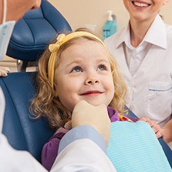 Smiling little girl in dental chair