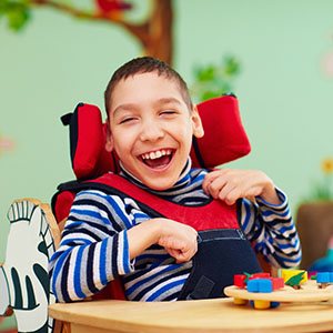 Boy with special needs smiling after special needs dentistry in Casper, WY