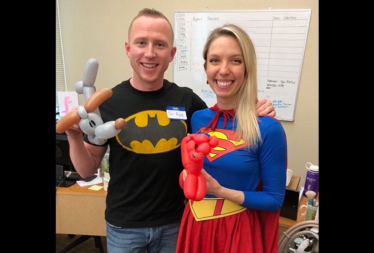 Doctor Paulson and dental team member in super hero costumes