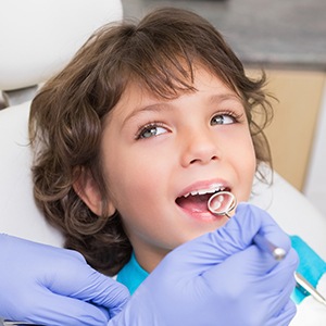 Child receiving dental exam