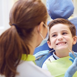 Child receiving dental sealants