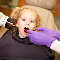 Child getting a bitewing X-ray