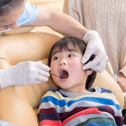 Young boy visiting Casper emergency pediatric dentist