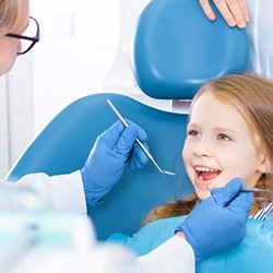 Child undergoing exam in dental clinic