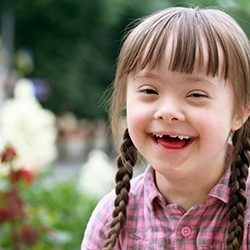 Portrait of happy special needs child