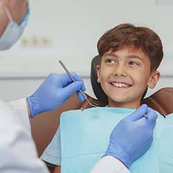Boy receiving dental checkup in Casper