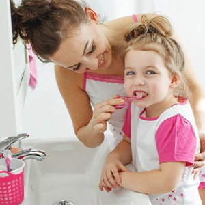 Child receiving dental sealants