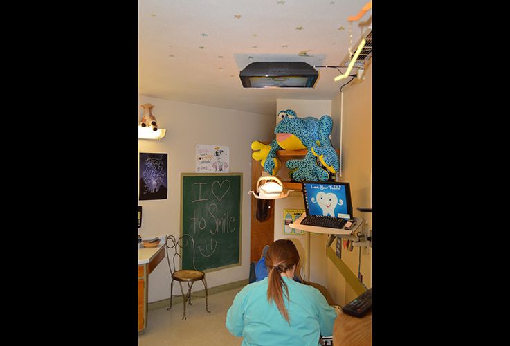 Fun dental exam room with toys and games