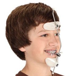 Preteen boy using reverse pull facemask