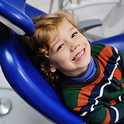 Young boy smiling at dentist