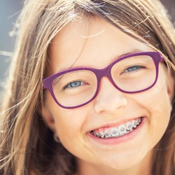 young girl with braces