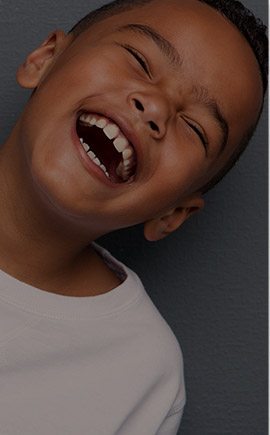 Laughing little boy with healthy smile