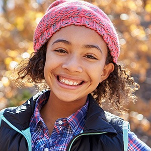 Smiling young girl outdoors