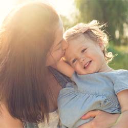 Girl and mom smiling in Casper