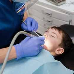 Young patient undergoing dental procedure