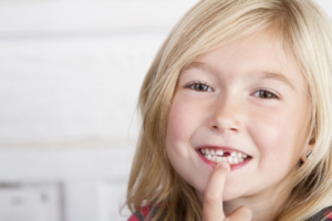 Child with missing baby tooth