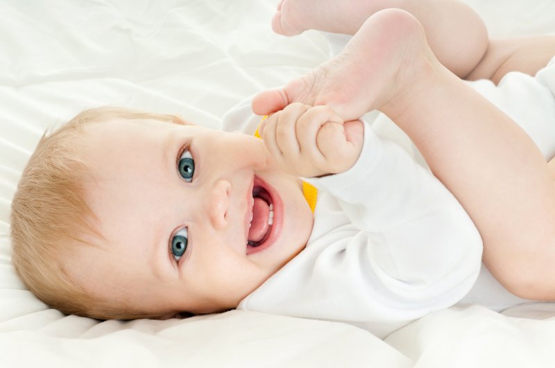 baby with several primary teeth